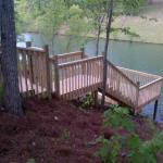 wood steps leading down to a fishing deck