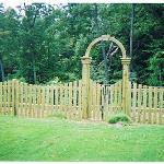 4' Tall Swayed Picket Fence with Arch over double gate.
