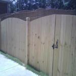 6' Tall Arched Privacy Fence with Double Gate.  The Double Gate has a removable post in the center for additional support of the hinges and latches.